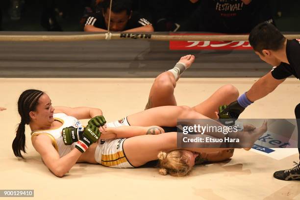 Shinju Nozawa Auclair of the United States secures an arm bar submission against Chelsea LaGrasse of the United States in the women's bout during the...