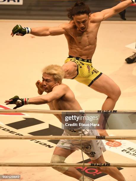 Yusuke Yachi of Japan kicks Takanori Gomi of Japan in the bout during the RIZIN Fighting World Grand-Prix 2017 final Round at Saitama Super Arena on...