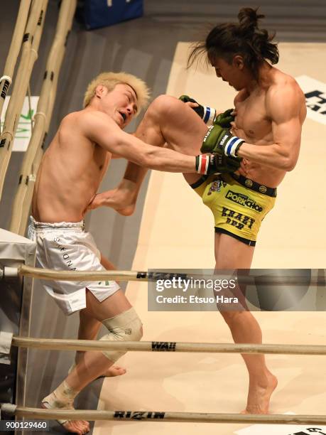 Yusuke Yachi of Japan kicks Takanori Gomi of Japan in the bout during the RIZIN Fighting World Grand-Prix 2017 final Round at Saitama Super Arena on...