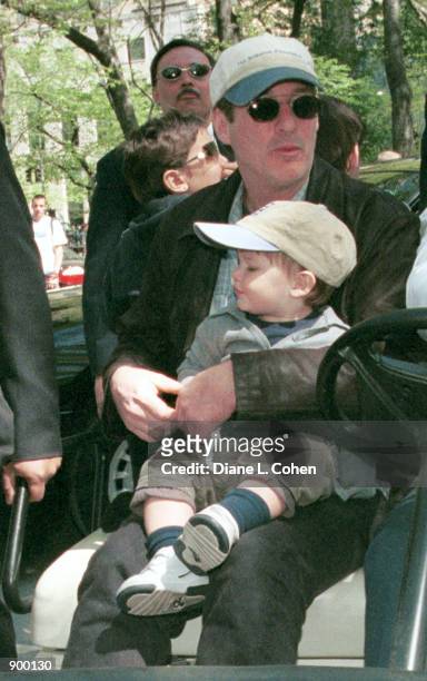Actor Richard Gere and his son Homer James Jigme Gere arrive for the "Kids for Kids" Carnival hosted by The Elizabeth Glaser Pediatric AIDS...