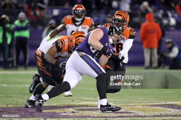 Tight end Nick Boyle of the Baltimore Ravens runs with the ball in the fourth quarter against the Cincinnati Bengals at M&T Bank Stadium on December...