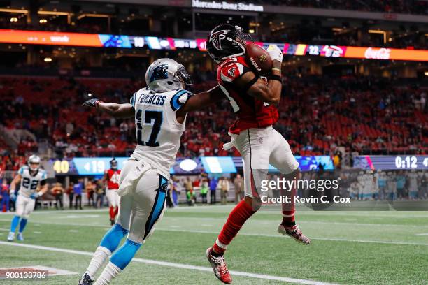 Robert Alford of the Atlanta Falcons intercepts a pass intended for Devin Funchess of the Carolina Panthers to end the game against the Carolina...