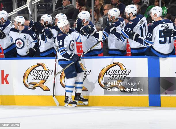 Marko Dano of the Winnipeg Jets celebrates after a goal during the game against the Edmonton Oilers on December 31, 2017 at Rogers Place in Edmonton,...