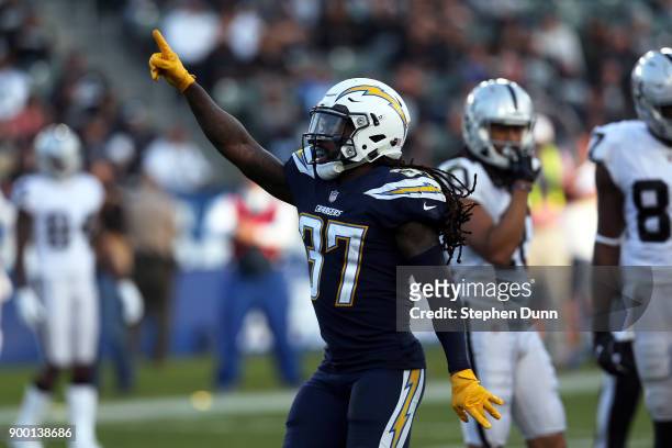 Jahleel Addae of the Los Angeles Chargers celebrates after the Chargers fumble recovery during the game against the Oakland Raiders at StubHub Center...