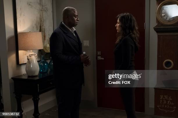 Andre Braugher and Stephanie Beatriz in the Game Night - Godfather special one hour episode of BROOKLYN NINE-NINE airing Tuesday, Dec. 12 on FOX.