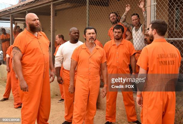 Guest star Winston James Francis , guest star Lou Diamond Phillips , guest star Tim Meadows and Andy Samberg in the "The Big House Pt.2" episode of...