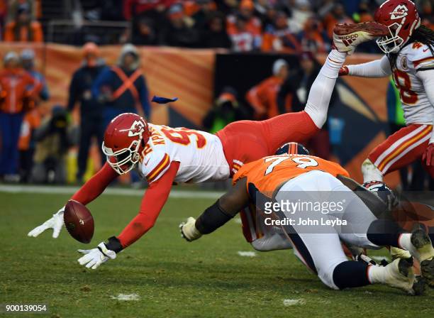 Kansas City Chiefs linebacker Tanoh Kpassagnon dives after a fumble by Denver Broncos quarterback Paxton Lynch during the third quarter on December...