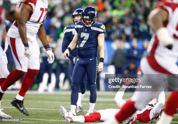 Kicker Blair Walsh of the Seattle Seahawks reacts after missing a 48 yard field goal attempt to take the lead over the Arizona Cardinals late in the...