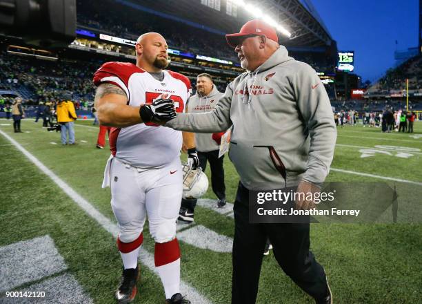 Arizona Cardinals head coach Bruce Arians greets A.Q. Shipley after their win over the Seattle Seahawks at CenturyLink Field on December 31, 2017 in...