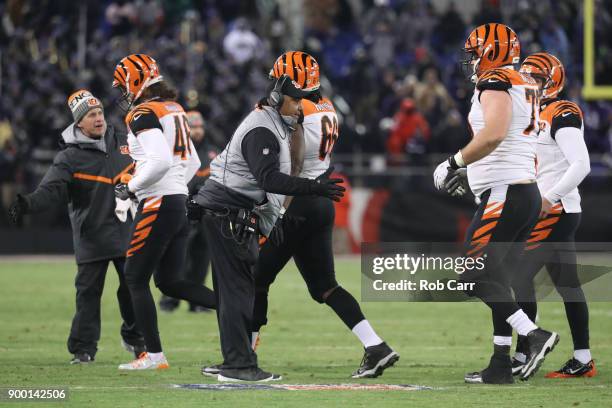 Head coach Marvin Lewis of the Cincinnati Bengals celebrates after a touchdown in the fourth quarter against the Baltimore Ravens at M&T Bank Stadium...