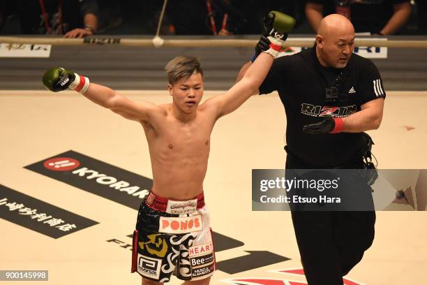 Tenshin Nasukawa of Japan celebrates his KO victory against Yuta Cat Hamamoto of Japan in the kick boxing bout during the RIZIN Fighting World...