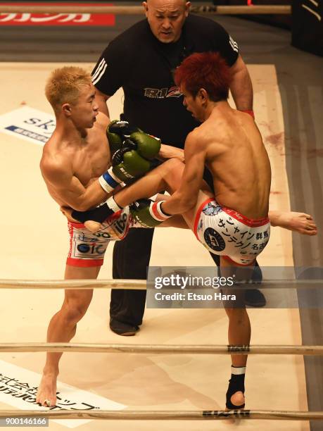 Mitsuhisa Sunabe of Japan and Yamato Fujita of Japan compete in the kick boxing bout during the RIZIN Fighting World Grand-Prix 2017 final Round at...