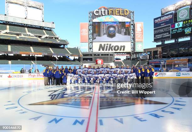Buffalo Sabres players and staff pose for a team photo during Practice Day for the 2018 Bridgestone NHL Winter Classic at Citi Field on December 31,...