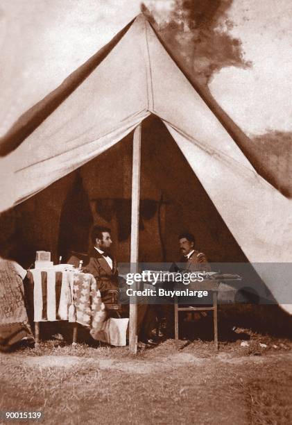 President Abraham Lincoln and General George B. McClellan in the general's tent at Antietam, Maryland after the Battle of Antietam during the...