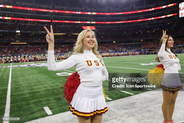 Arlington, TX A USC cheerleader performs for the crowd during the Goodyear Cotton Bowl Classic between the USC Trojans and the Ohio State Buckeyes on...