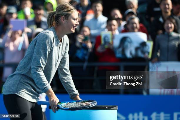 Maria Sharapova of Russia attends Kids Day during Day 1 of 2018 WTA Shenzhen Open at Longgang International Tennis Center on December 31, 2017 in...