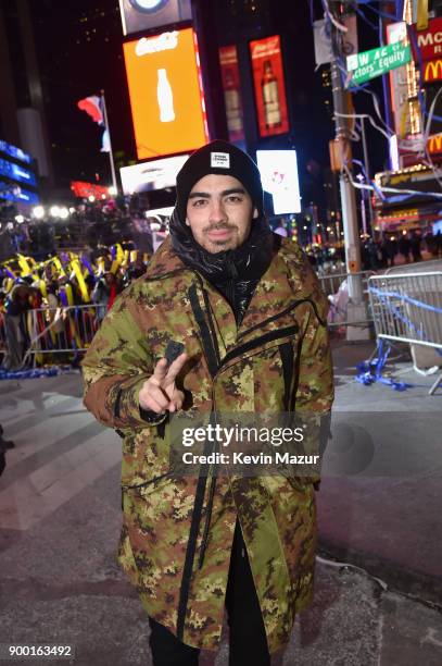 Joe Jonas poses at the Dick Clark's New Year's Rockin' Eve with Ryan Seacrest 2018 on December 31, 2017 in New York City.