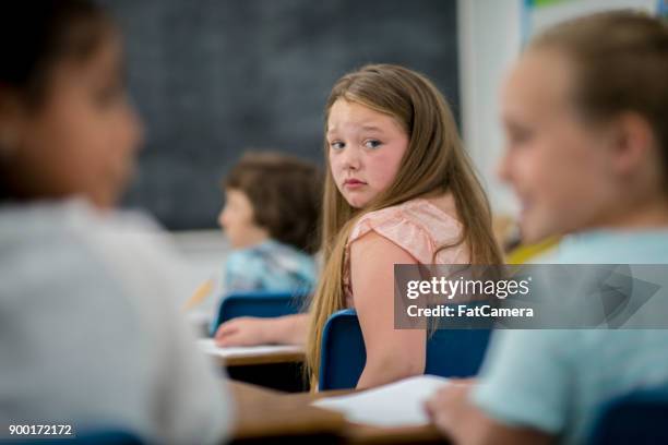 being bullied - sad child stock pictures, royalty-free photos & images