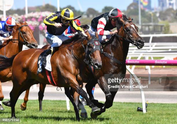 Damien Oliver riding Lord of the Sky defeats Mark Zahra riding Flippant in Race 6, the Standish Handicap during Melbourne Racing at Flemington...
