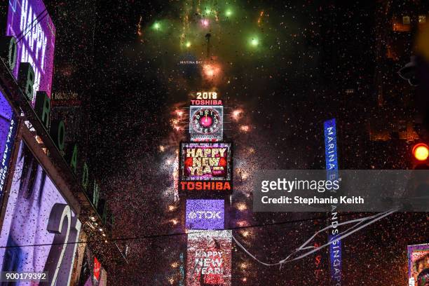 Fireworks explode in Times Square on New Year's Eve on January 1, 2018 in New York City.
