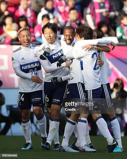 Yokohama F Marinos forward Sho Ito celebrates his goal with teammates during the Emperor's Cup football final between Cerezo Osaka and the Yokohama F...