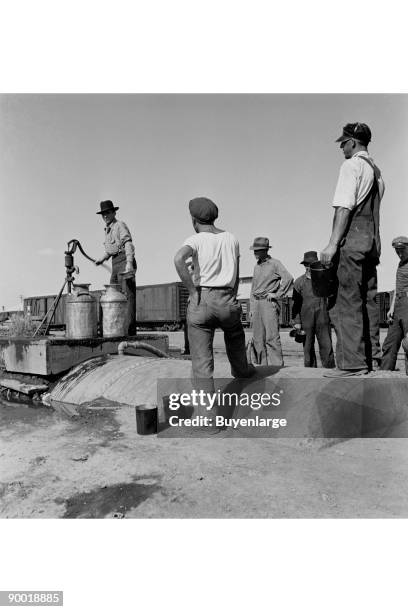 Drinking water for the whole town, also for the migrant camp across the road. Tulelake, Siskiyou County, California.