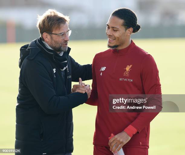 Virgil van Dijk new signing of Liverpool with Jurgen Klopp manager of Liverpool at Melwood Training Ground on December 31, 2017 in Liverpool, England.