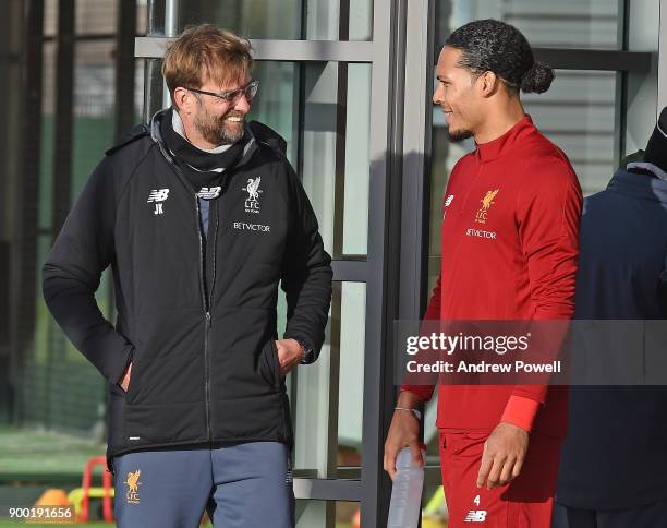 Virgil van Dijk new signing of Liverpool with Jurgen Klopp manager of Liverpool at Melwood Training Ground on December 31, 2017 in Liverpool, England.