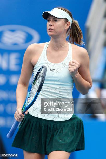 Maria Sharapova of Russia reacts after winning the match against Mihaela Buzarnescu of Romania during Day 2 of 2018 WTA Shenzhen Open at Longgang...