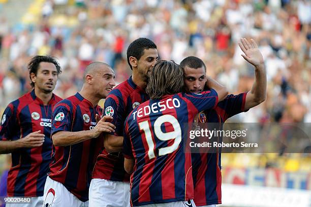 Pablo Osvaldo of Bologna celebrates with Giacomo Tedesco and teamates after scoring the opening goal of the Serie A match between Bologna and...