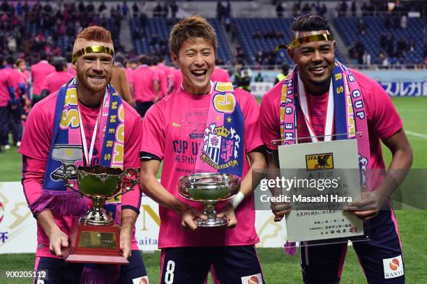 Souza,Yoichiro Kakitani and Ricardo Santos of Cerezo Osaka pose for photograph after the 97th All Japan Football Championship final between Cerezo...