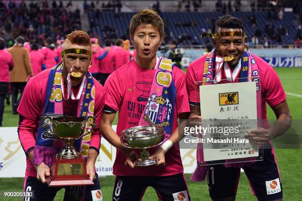 Souza,Yoichiro Kakitani and Ricardo Santos of Cerezo Osaka pose for photograph after the 97th All Japan Football Championship final between Cerezo...