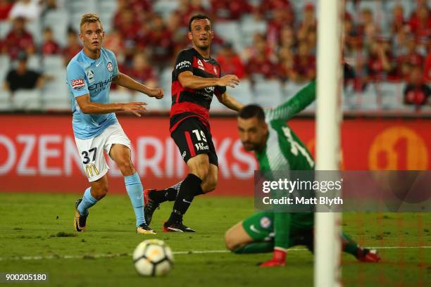 Mark Bridge of the Wanderers kicks the ball to score a goal during the round 13 A-League match between the Western Sydney Wanderers and Melbourne...