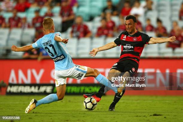 Mark Bridge of the Wanderers kicks the ball to score a goal during the round 13 A-League match between the Western Sydney Wanderers and Melbourne...