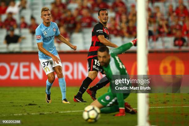 Mark Bridge of the Wanderers kicks the ball to score a goal during the round 13 A-League match between the Western Sydney Wanderers and Melbourne...