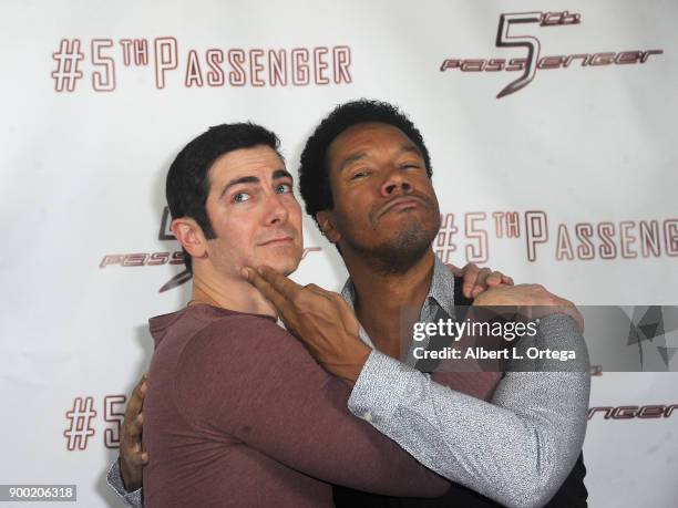 Actors Ryan T. Husk and Rico E. Anderson arrive for the Cast And Crew Screening Of 5th Passenger held at TCL Chinese 6 Theatres on December 13, 2017...