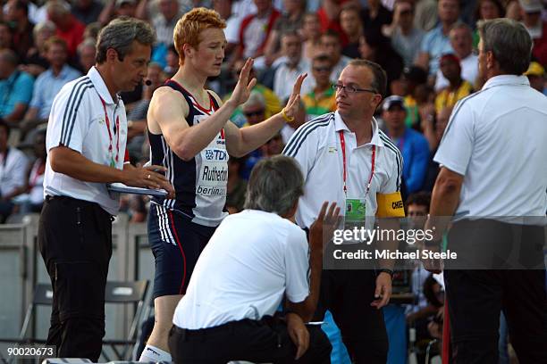 Greg Rutherford of Great Britain & Northern Ireland talks with the officials in the men's Long Jump Final during day eight of the 12th IAAF World...