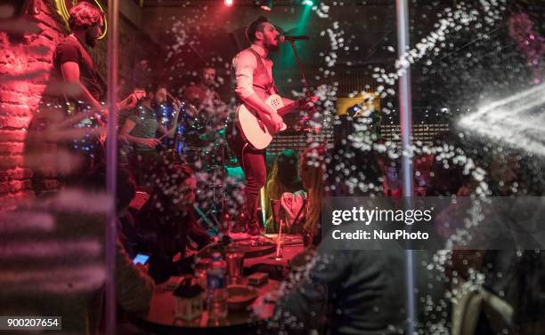 Turkish citizens celebrate in the Taksim district of Istanbul on the last night of 2017. On this day of last year 39 people were killed in an armed...