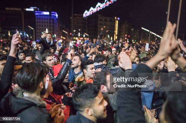 Revellers bid farewell to 2017 as they gather to celebrate New Years in Istanbul on December 31, 2017. Turkey arrested on December 31 more suspected...