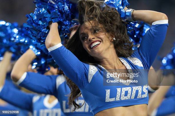 The Detroit Lions cheerleaders perform during the first half of an NFL football game between the Green Bay Packers and the Detroit Lions in Detroit,...