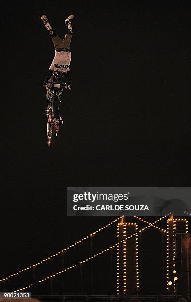 An unidentified motorcross rider is pictured in action at Battersea Power Station, in London on August 22, 2009. The rider was competing in the Red...