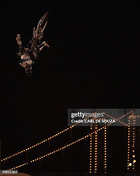 An unidentified motorcross rider is pictured in action at Battersea Power Station, in London on August 22, 2009. The rider was competing in the Red...