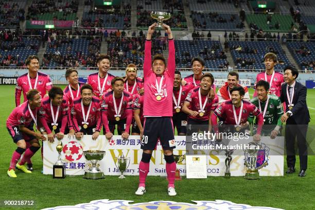 Noriyuki Sakemoto of Cerezo Osaka lifts the trophy after the 97th All Japan Football Championship final between Cerezo Osaka and Yokohama F.Marinos...