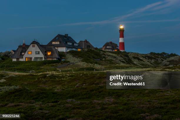 germany, north frisia, sylt, hoernum, thatched-roof houses and lighthouse - isla de sylt fotografías e imágenes de stock