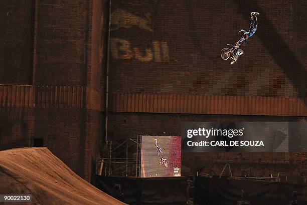 Motorcross rider Nate Adams is pictured in action in front of Battersea Power Station, London on August 22, 2009 during the Red Bull X Fighters world...