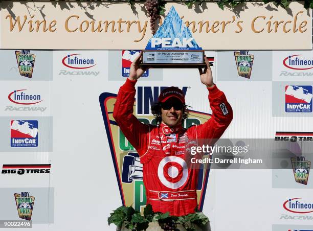 Dario Franchitti driver of the Target Chip Ganassi Racing Dallara Honda celebrates pole position for the IRL IndyCar Series Indy Grand Prix of Sonoma...