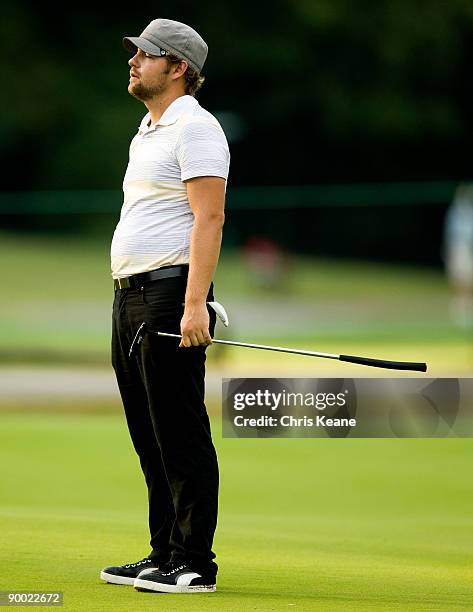 Ryan Moore reacts to a missed putt on the seventh hole during the third round of the Wyndham Championship at Sedgefield Country Club on August 22,...