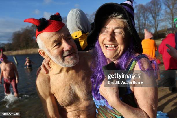 Winter swimmers prepare to bathe in Orankesee lake on January 1, 2018 in Berlin, Germany. Unseasonably higher-than-average winter temperatures meant...