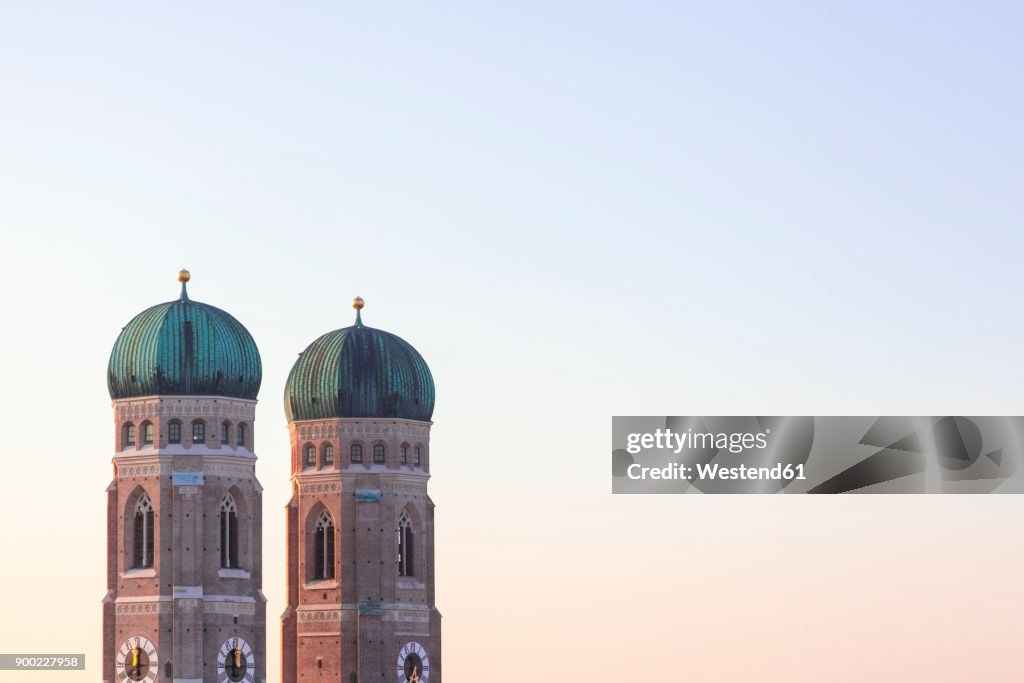 Germany, Munich, view to spires of Cathedral of Our Lady at twilight