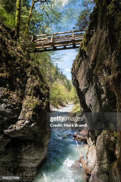 wooden bridge over the river partnach, partnach gorge, garmisch-partenkirchen, werdenfelser land, upper bavaria, bavaria, germany - partnach gorge stock pictures, royalty-free photos & images